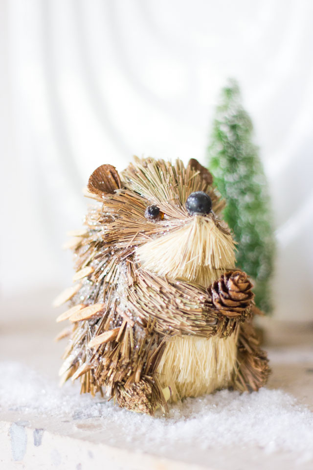 Mini hedgehog ornament in this winter woodland mantel! Mini hedgehog ornament in this winter woodland mantel!