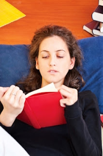“Woman Reading Book At Home” by marin FreeDigitalPhotos.net