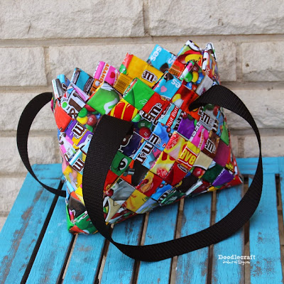 http://www.doodlecraftblog.com/2015/05/candy-wrapper-woven-pursebag.html