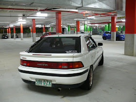 Mazda Astina, 323F BG, Familia, biały, tył, cenione auto, kultowy model, z lat 90, japoński samochód, motoryzacja, zdjęcia