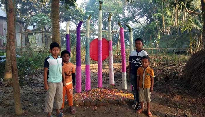 The children paid their respects at the Shaheed Minar, which he built in Tangail