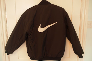 nike jacket with logo on back