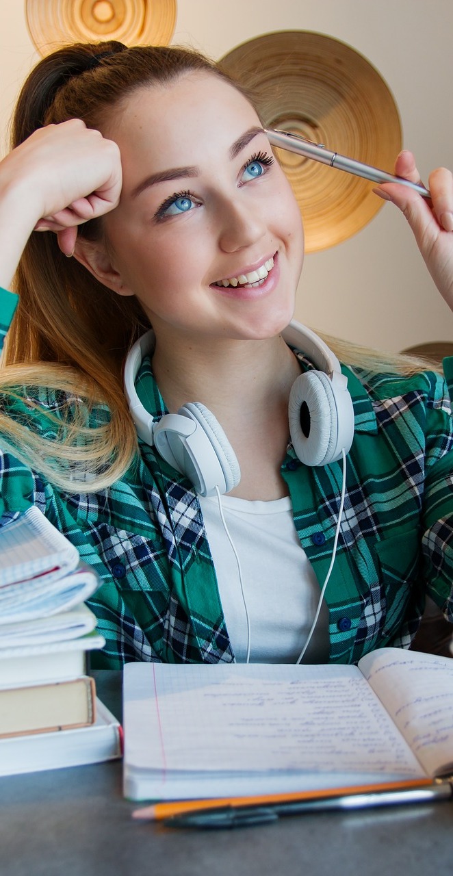 A girl student studying. A girl student studying.