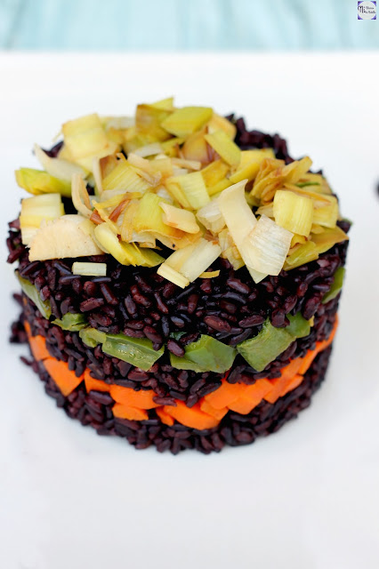timbal de arroz negro con verduras