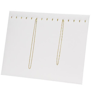 The Necklace and Chain Display Pad with Easel from Nile Corp can hold multiple necklaces
