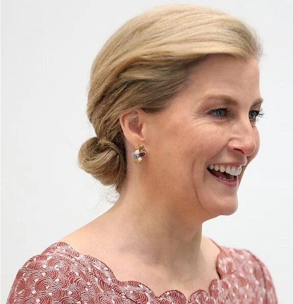 The Countess of Wessex wore Alaïa Multicolor scalloped eyelet lace dress, heavenly necklaces diamond earrings. Gianvito Rossi