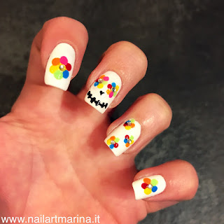 Unghie floreali molto eleganti create per la festa di halloween Unghie floreali molto eleganti create per la festa di halloween