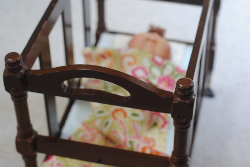 DIY doll crib from a thrift store magazine rack (doll furniture)