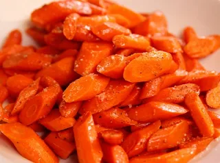 Glazed carrots with orange and ginger recipe are a tasty favorite North African dish.