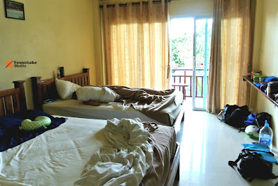 A guesthouse of one queen bed and a single bed of Big Blue DIving, Koh Tao, Thailand with swimming pool view