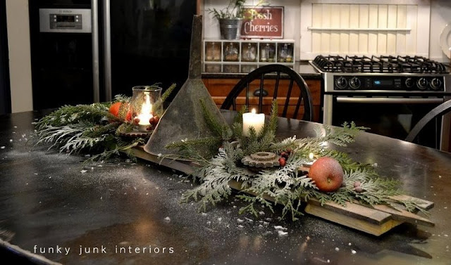 Learn how to arrange this rusty junk gear and funnel Christmas candle centrepiece using industrial gears, oil funnel and reclaimed wood! Click to visit full tutorial.