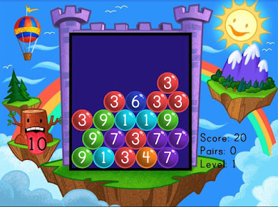 http://www.education.com/game/number-pairs-bubble-buster/