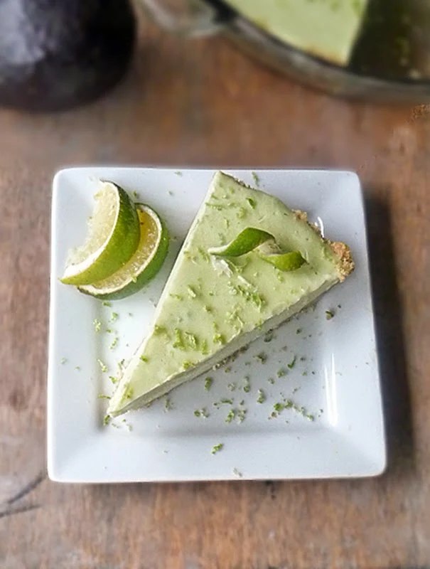 Avocado Lime Cheesecake Recipe | by Life Tastes Good is da bomb! Trust me on this one! I was skeptical too! I mean I LOVE avocados, but in a cheesecake? Come on! That's just weird!! Or is it? #Dessert #Pie