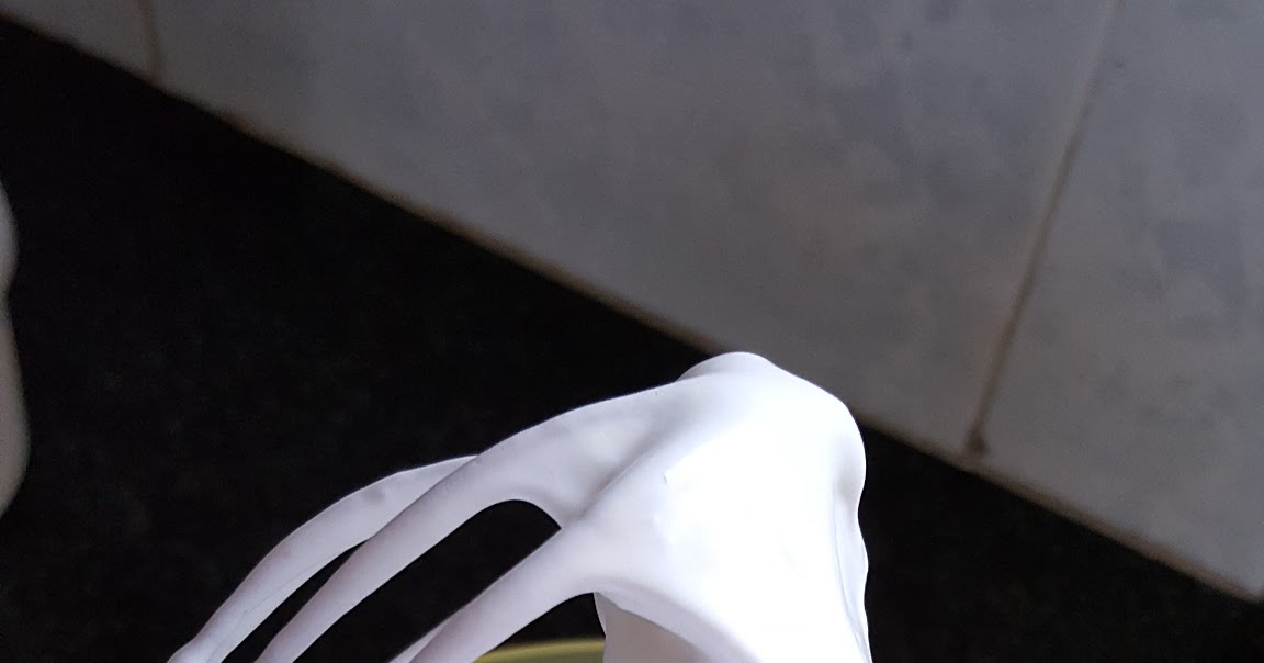 Hand beaten egg white into soft peak