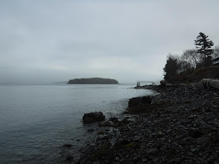 Bar Island and Frenchman Bay under fog from Atlantic Seaside in Bar Harbor, Maine