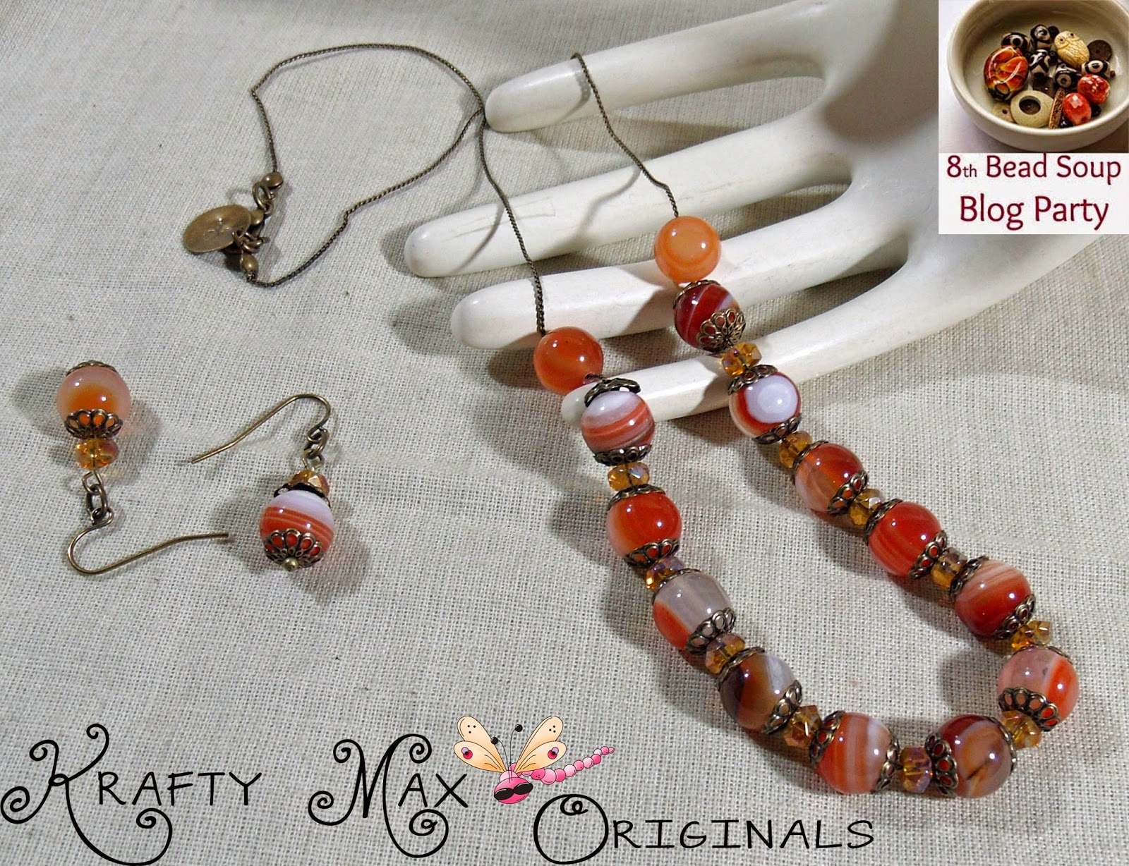 http://www.artfire.com/ext/shop/product_view/KraftyMax/9283209/8th_bead_soup_blog_party_-_glowing_red_agate_neclace_and_earrings/handmade/jewelry/sets/gemstone