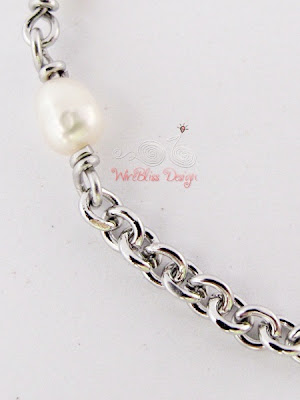 Close up of wire wrapped minima bracelet (Minlet) with pearl - Wisdom