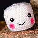 http://www.ravelry.com/patterns/library/campfire-the-mini-marshmallow-amigurumi