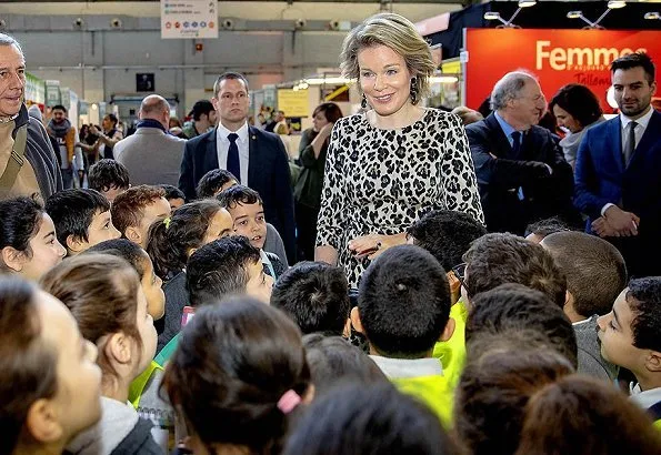 Queen Mathilde is wore her Natan leopard-print dress, Armani satin clutch