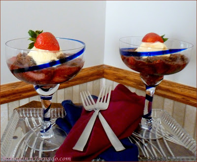 Chocolate Berry Cobbler, chocolate cookies mixed with fresh berries baked with a chocolate topping. Serve warm with vanilla ice cream | Recipe developed by www.BakingInATornado.com | #recipe #chocolate #berries #dessert