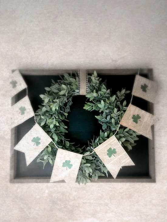 book page banner on a chalkboard and a wreath