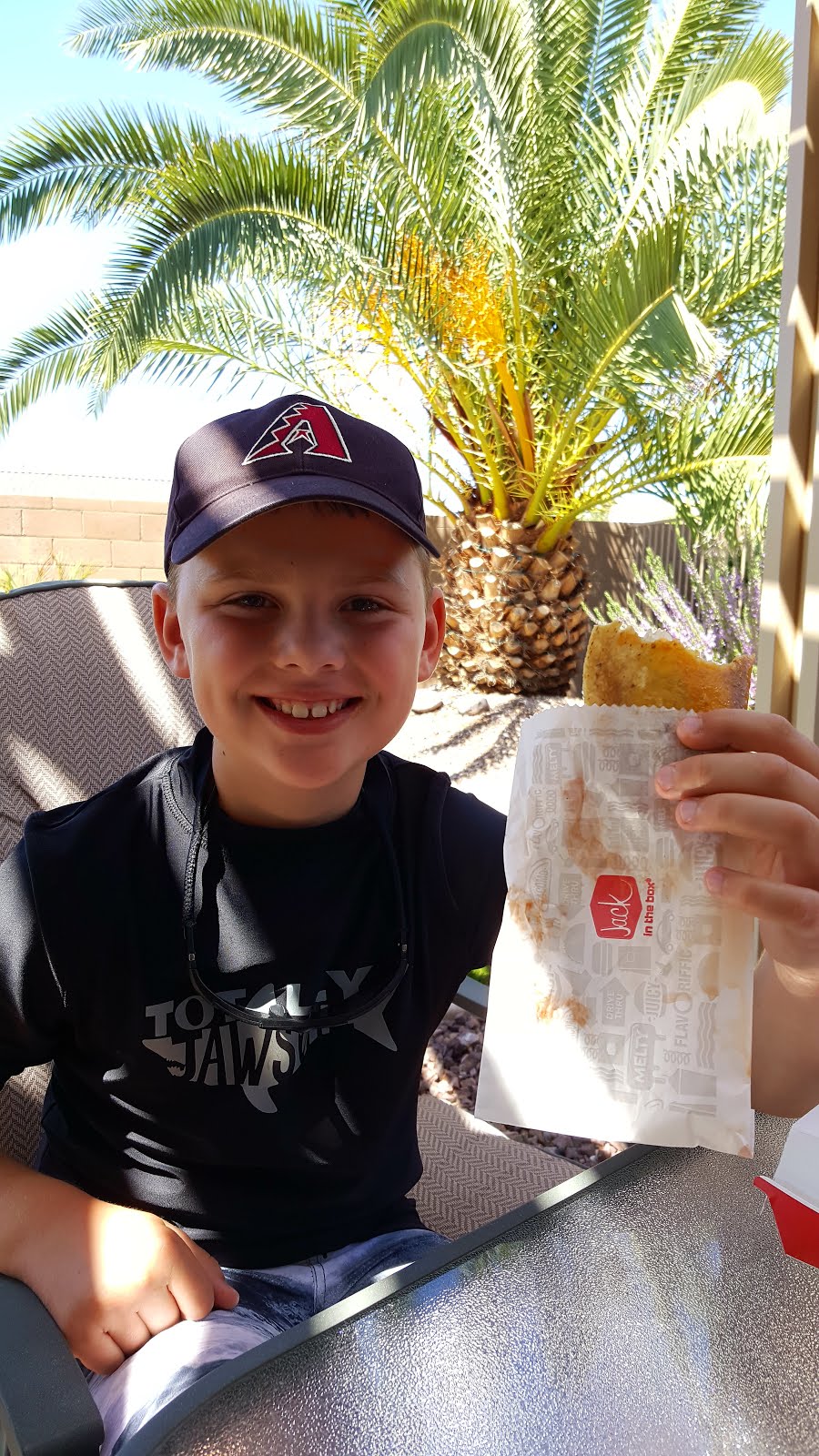 Tyler Eating his First Jack in the Box Taco!
