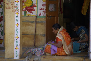 INDIA 2011: Women embroidering sequins on beautiful sari's