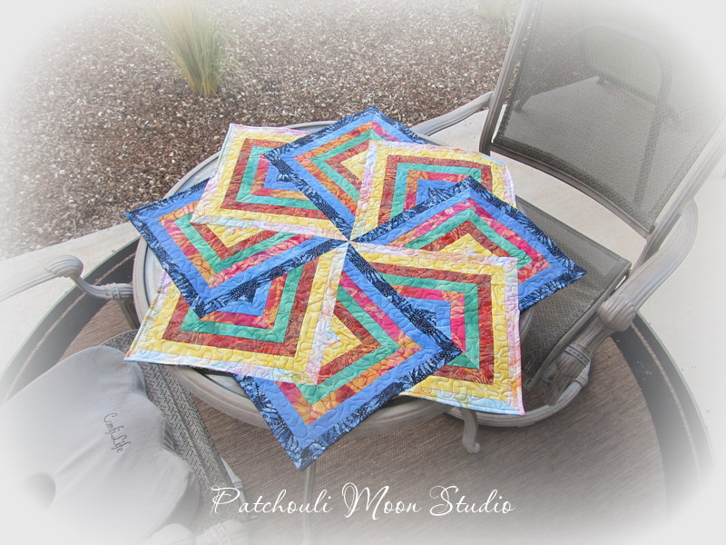 Patchouli Moon Studio Spinning Star Quilted Table Topper
