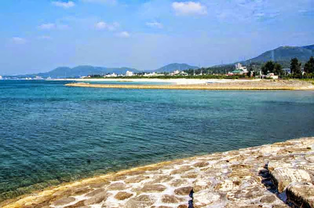 View, looking west, beach, mountains