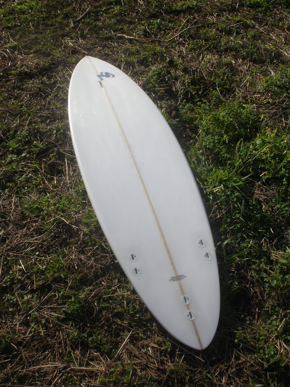 Organic Surf Liquid Glass surfboard glassing & repairsLaminação para