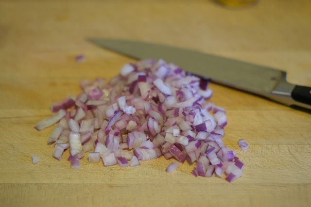 The onions for the onion jam diced. 
