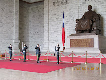 Changing of the Guard before statue of Chiang Kai-Shek, his Memorial Bldg, Taipei, Taiwan