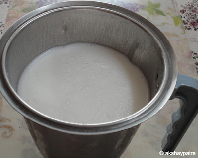 pour the yogurt in mixer jar
