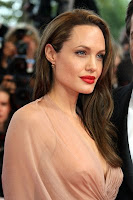 Beautiful Angelina Jolie in elegant dress with make-up