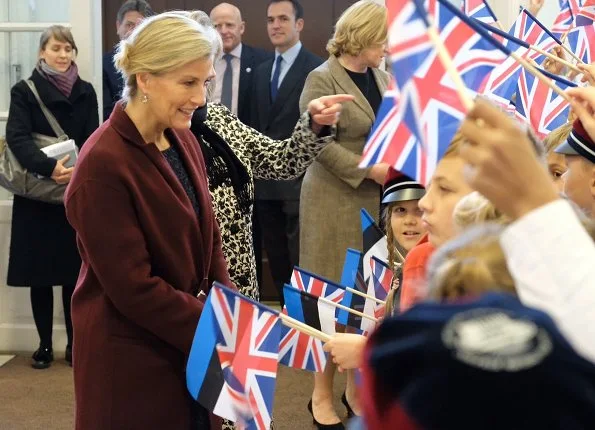 Prince Edward, Earl of Wessex and Sophie Countess of Wessex visited the Tallinn English College. Millington Wool Crepe Coat and wool dress