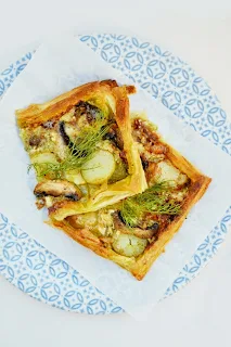A simple puff tart topped with pesto, brie, potatoes and mushroom. Good served warm or cold.