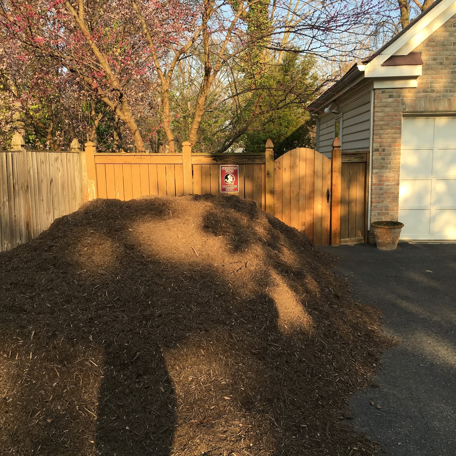 Mom The incredible shrinking mulch pile