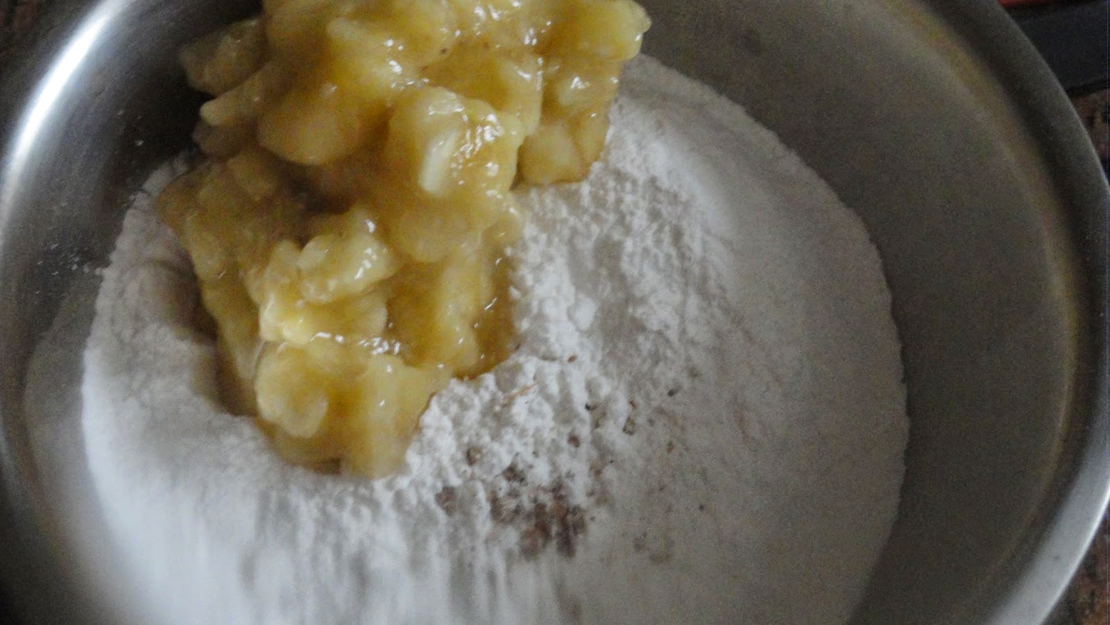 Mix banana,cardamom to rice flour