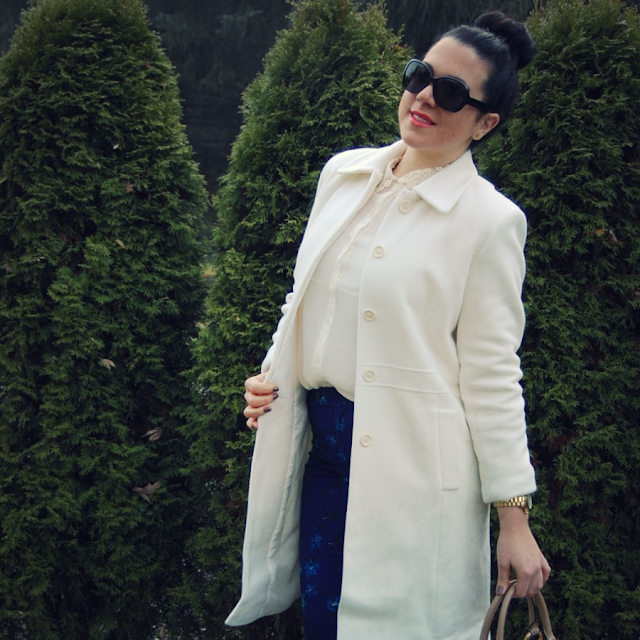 Winter white wool coat with Gap floral pants and a Marc Jacobs handbag