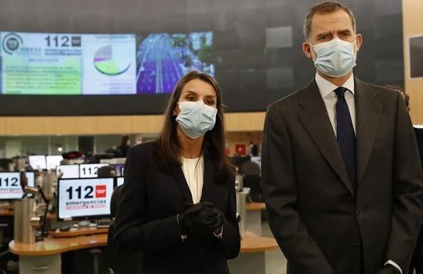 King Felipe and Queen Letizia of Spain visited the 112 Emergency Center in Madrid, Letizia wore Hugo Boss blouse