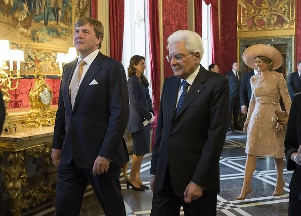 Italy's President Mr. S. Mattarella and Mrs Laura Mattarella (Daughter of the President). Queen Maxima wore a Natan branded dress again which is her favorite brand