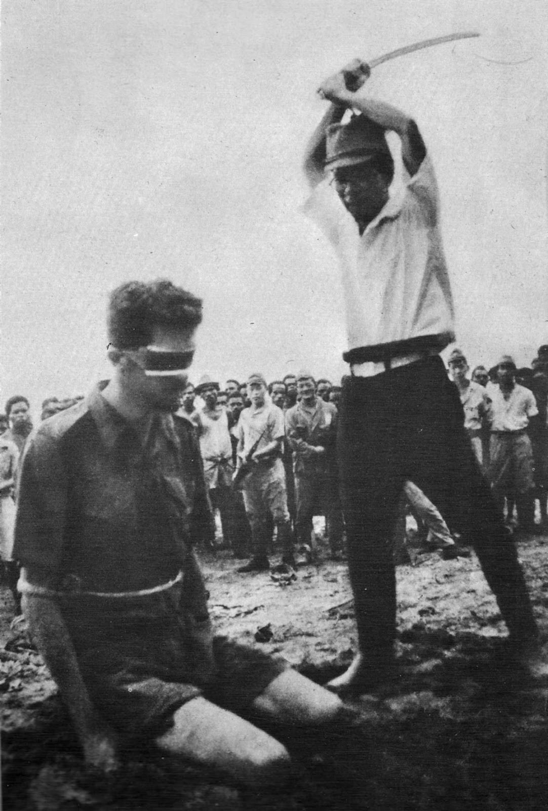 A photograph of the Japanese soldier Yasuno Chikao an instant before he strikes off Siffleet’s head was taken from the body of a Japanese casualty later in the war, 1943.