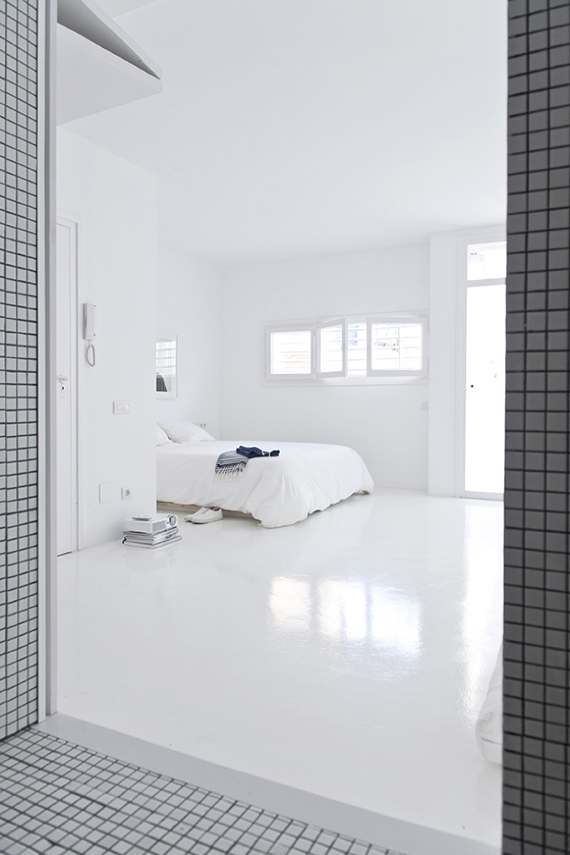 The White Retreat, Sitges, Spain. Small all white apartment design by CaSA. Photo by Roberto Ruiz
