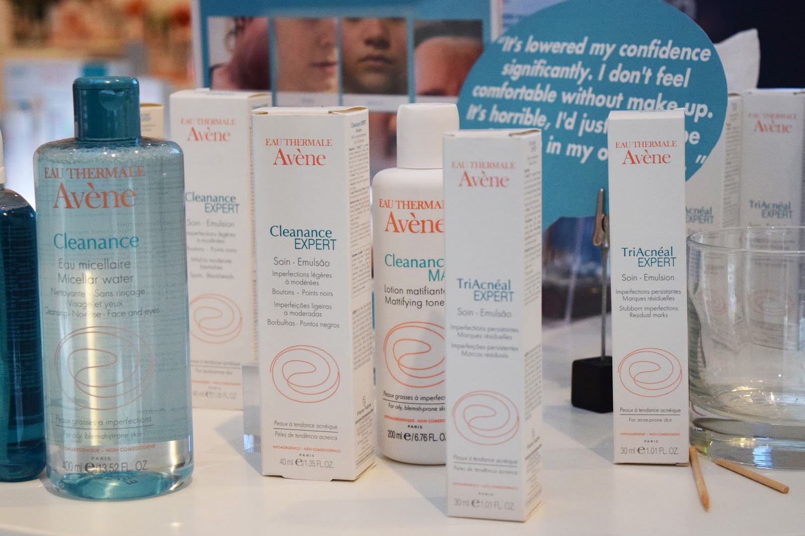 a stand showing Avene skin care products