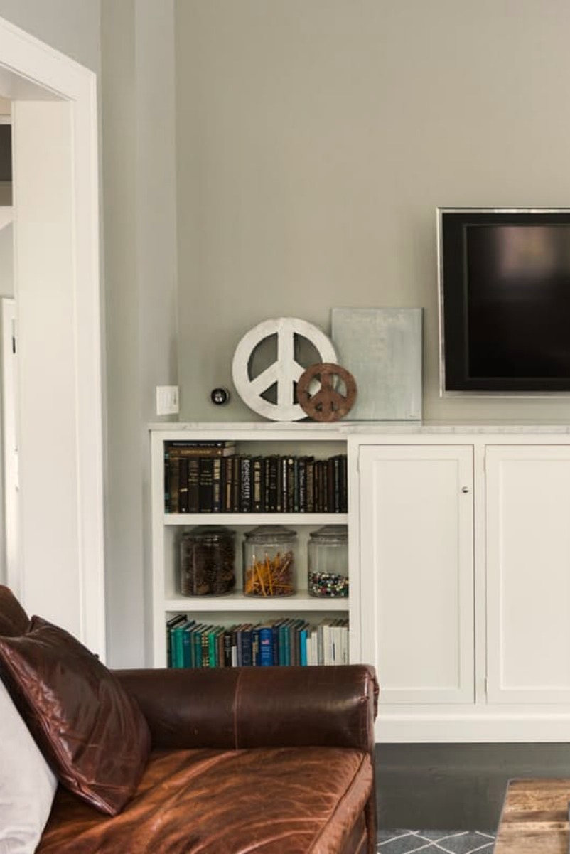 Modern farmhouse great room with white built-ins for media wall on Hello Lovely Studio