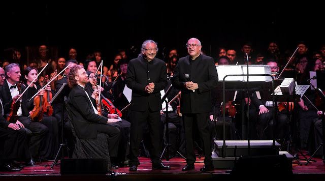 Composer Nobuo Uematsu and conductor Arnie Roth on stage at Plenary Hall KLCC. Photo credit: Creon Asia FB Page nobuo uematsu arnie roth kl malaysia distant worlds 2017