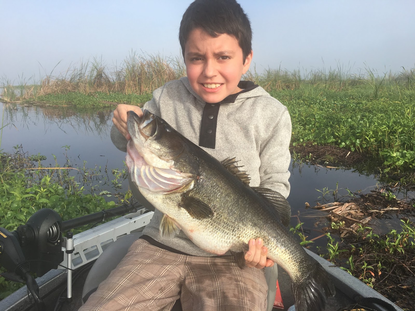Small Boy catches Big Bass! 1/25/2017 Lake Okeechobee Bass Fishing
