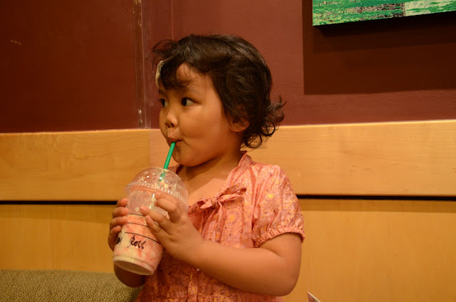 Kecil sipping coffee