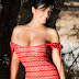 Denise Milani lifts up her little red dress in woods