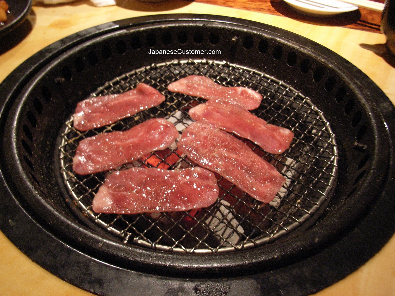 Beef barbeque restuarant in Japan copyright peter hanami 2004
